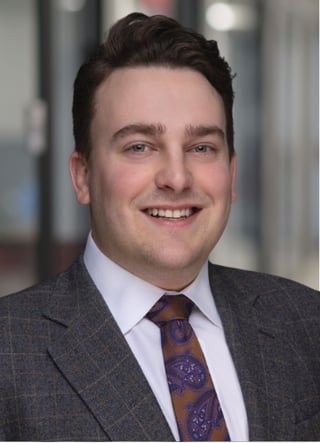 Greg M Headshot with background